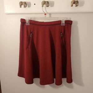 Maroon skirt with fake side zipper pockets